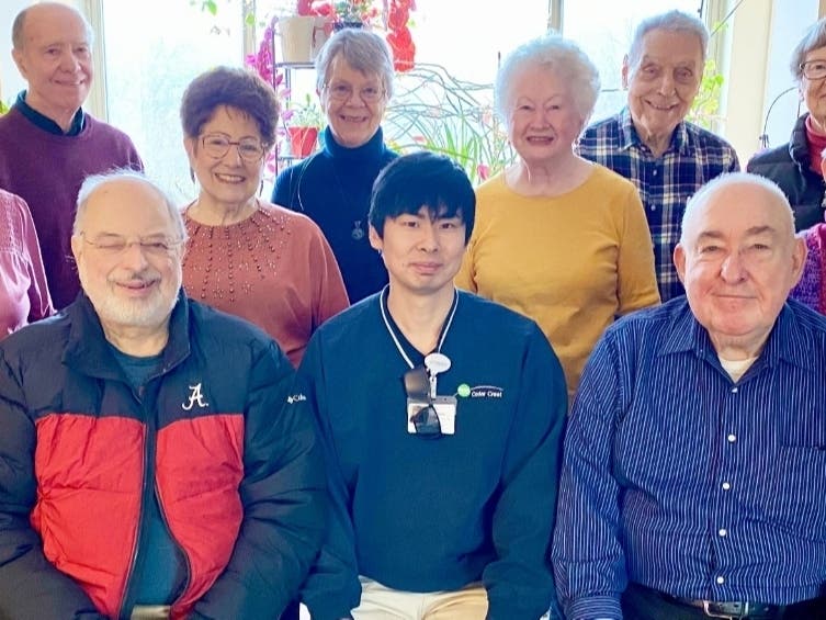 Cedar Crest garden club members, pictured with Grounds Worker Kenichi Matsumoto (front center), love getting together during the growing season to discuss their triumphs and learn more about what plants thrive in the northern New Jersey climate.