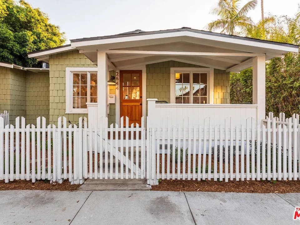 This cute bungalow in Santa Monica doubles the charm with both a front porch and a white picket fence