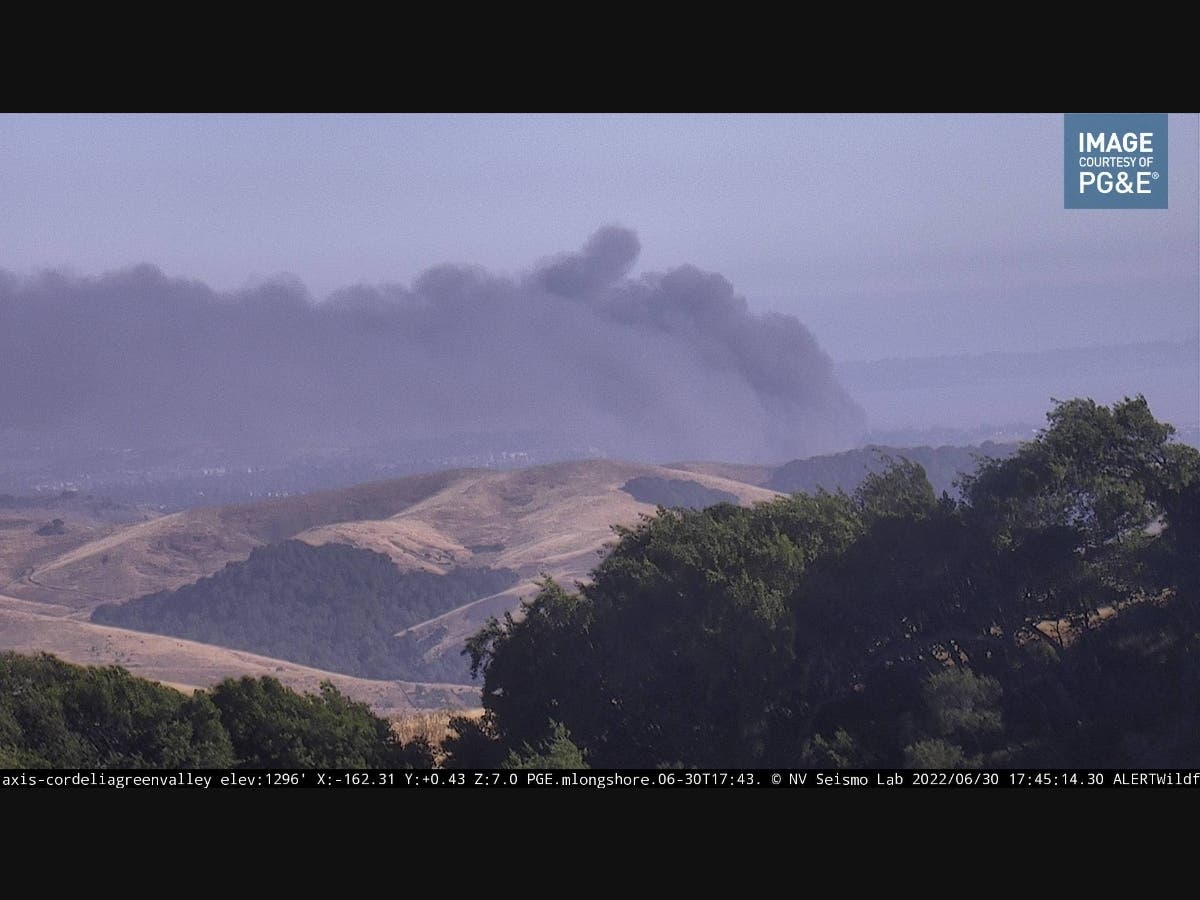 Thick, dark smoke rises from a commercial structure fire Thursday in Vallejo.