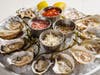 Water Grill restaurants are prepping Valentine's Day celebrations with photo booths & four-course feasts of oysters, lobster, filet mignon & more.