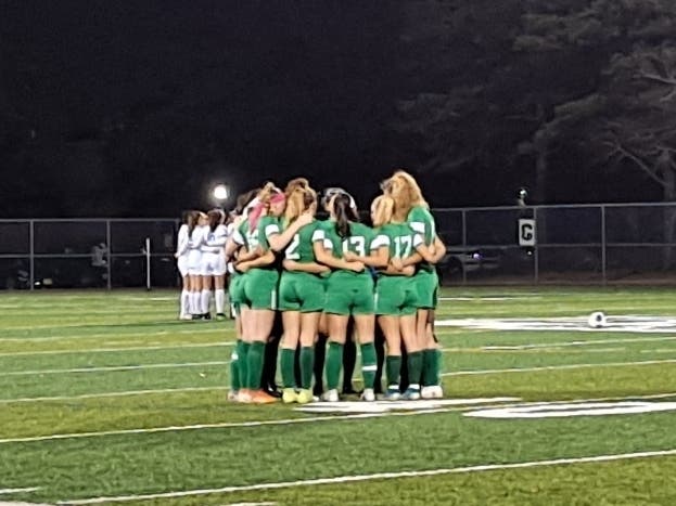 The Brick Township High School girls soccer team huddles before the start of the NJSIAA Central East D championship game on Sunday. 