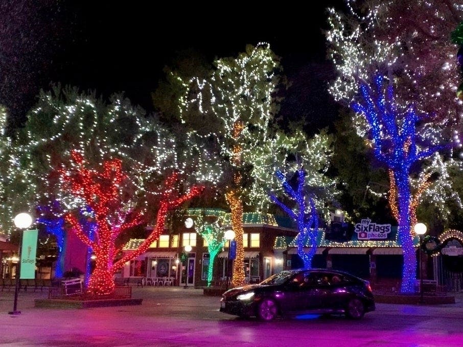 Patrons get to drive around inside Six Flags Great Adventure for the Holiday in the Park drive-thru experience.