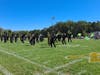 The Marching Mustangs belt out their music as they perform at halftime. 