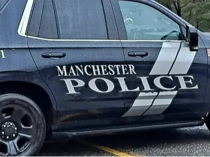 Manchester police said the motorcyclist had lost his helmet and was not responsive immediately after the crash. 