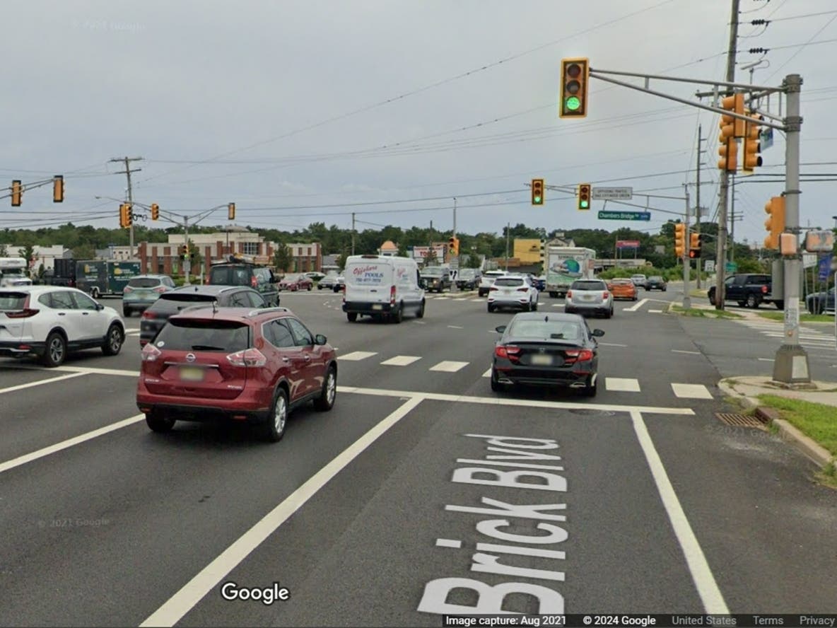 Traffic Signals Changing At Brick Intersection After Multiple Crashes