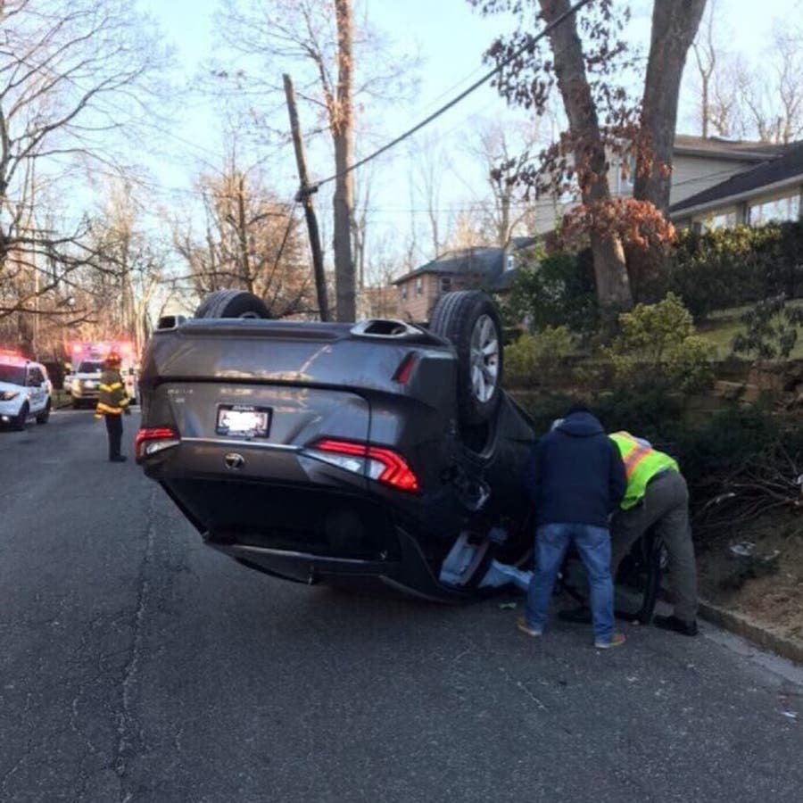 Car Overturns In Great Neck