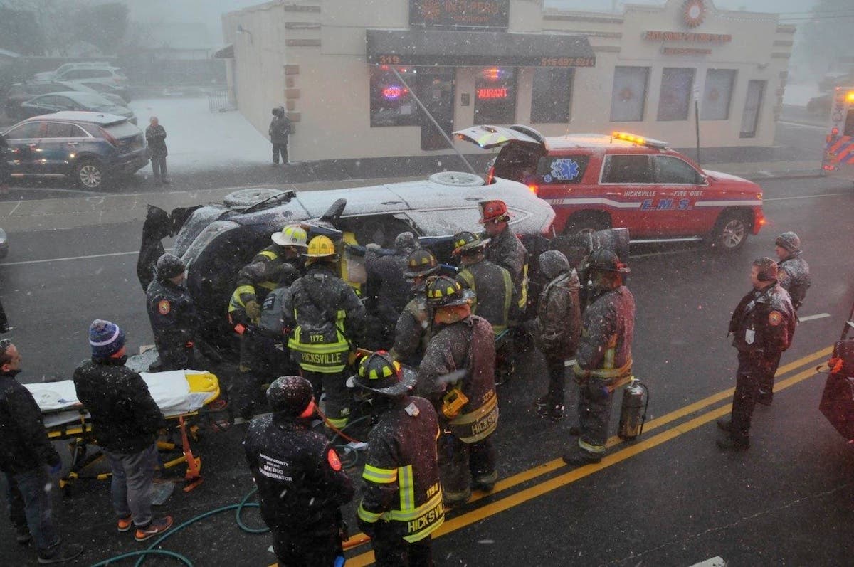 Driver Rescued From Overturned Vehicle During Snow Squall