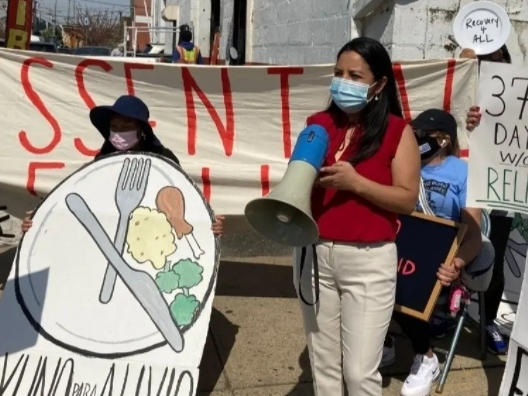 Activists rally in support of COVID-19 relief for undocumented residents in New Jersey in Newark in April 2021.