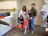 Dr. Jennifer Harvey, her husband Zach Harvey, and their three children cut the ribbon on Harvey Family Dental located on Highland Avenue in Needham.