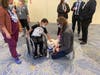 Maui with Mason, a patient at Children's Specialized Hospital in New Brunswick, on Monday.