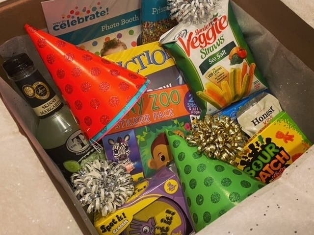 Amanda Hudes, the owner of an event planning business called "Smiling Through Chaos", has created the Celebrate Family Box which is full of games and activities, snacks and drinks, party hats, a baking mix and more delivered to homes on Dec. 31.