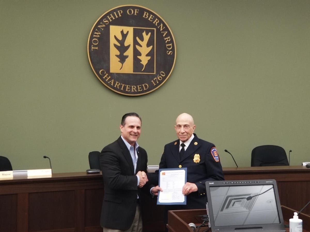 Mayor James Baldassare and Liberty Corner Firefighter Marc Friedman.