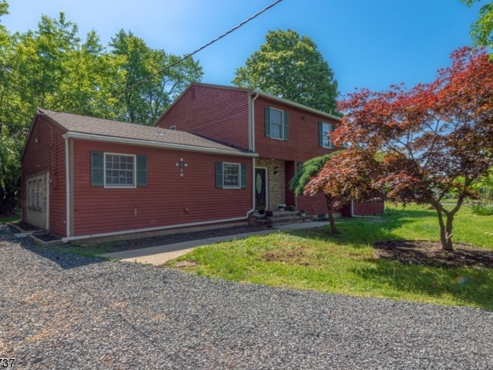 $499K Colonial Is Set Back On A Large And Shady Lot In Hillsborough