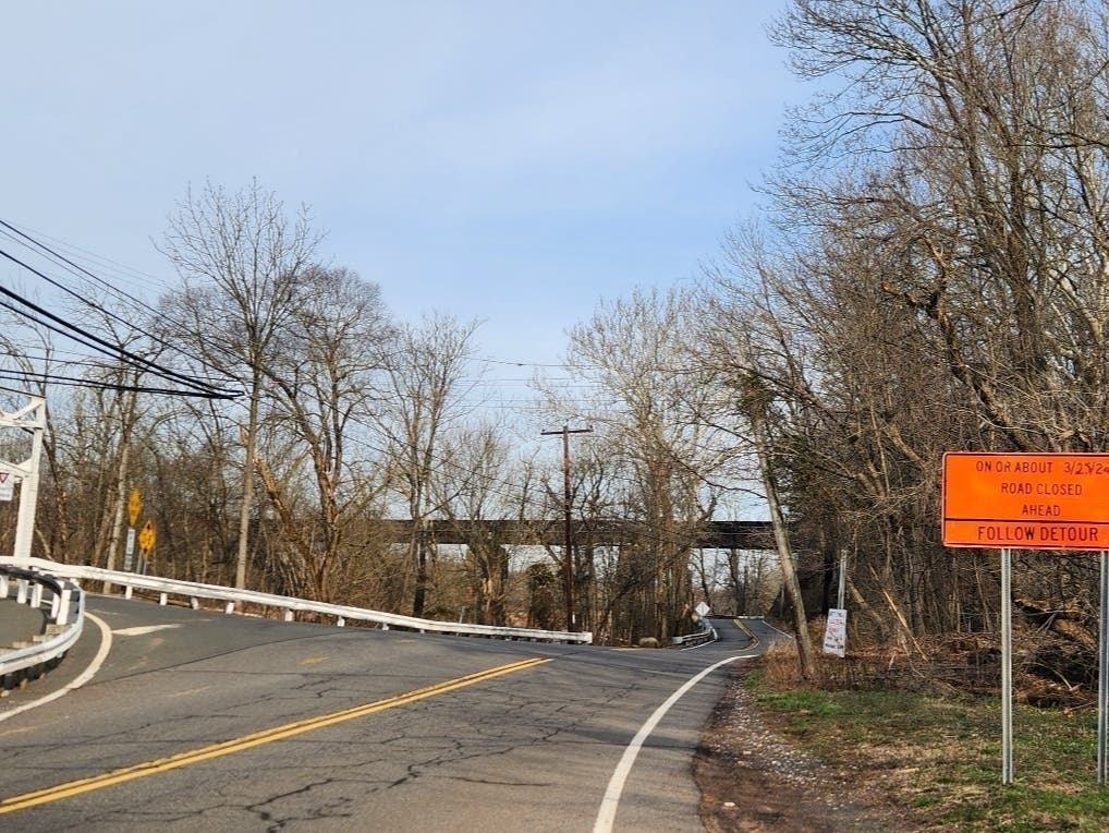 The intersection of Elm Street and River Road in Hillsborough, viewing the Norfolk Southern freight rail bridge. River Road will be closed from just north of this intersection for 1,000 feet on or about March 25 for approximately 8 months for repairs.