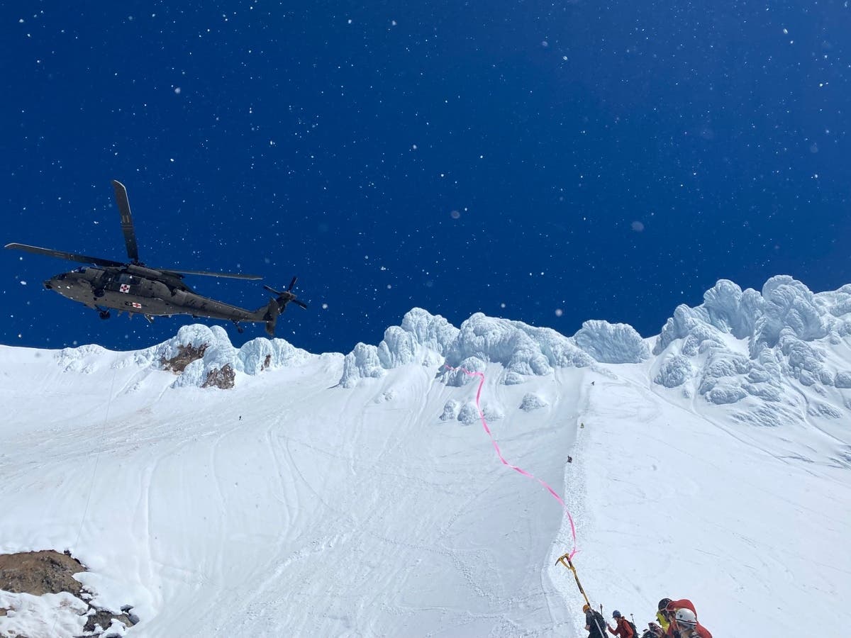 A helicopter from the Oregon Army National Guardhelping rescue a 31-year-old woman from Portland who fell several hundred feet while climbing Mt. Hood.