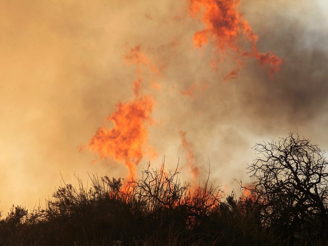 Firefighters Battle Brush Fire Near Jurupa Valley