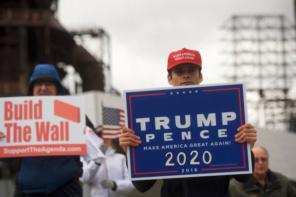  Ross Saveri, 22, joins fellow Donald Trump supporters demonstrating outside of a FOX News Town Hall.