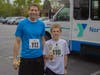 First finisher of the 5k with a time of 22:16, Jose Gonzalez of Northbrook, pose with Henry Gillis age 11, at the North Suburban YMCA Healthy Kids Day 5K Run/Walk on May 13, in Northbrook. 