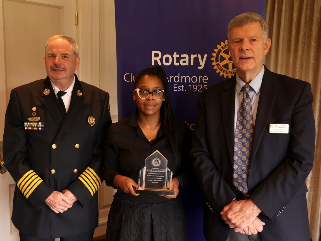 Merion Fire Company of Ardmore Chief Tom Hayden (left) and Attorney Fred Fromhold (right) were sworn in as Centennial Year Co-Presidents by Bethel AME Chuch's Rev. Carolyn Cavaness (center), who was the club's former president.