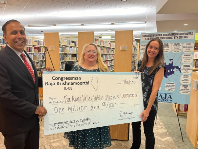 Congressman Krishnamoorthi presents the East Dundee branch of the Fox River Valley Public Library with one million in federal funding.