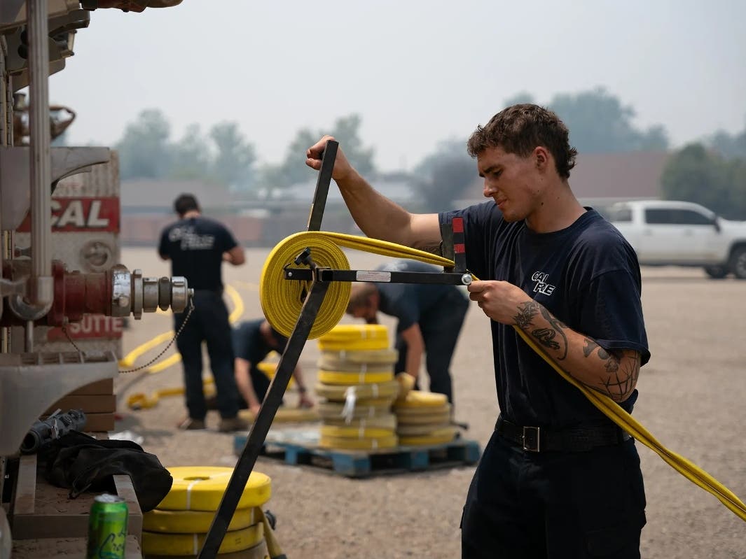 Chris Castleman, a Cal Fire firefighter, at the Park Fire command post in Chico on Aug. 2, 2024, shortly after returning from fighting the blaze. Castleman said he looks forward to sleeping in his hotel room after the 36-hour shift. 