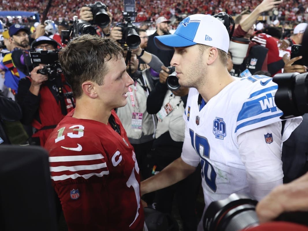 San Francisco 49ers quarterback Brock Purdy, left, talks with Detroit Lions quarterback Jared Goff after the NFC Championship NFL football game in Santa Clara, Calif., Sunday, Jan. 28, 2024. 