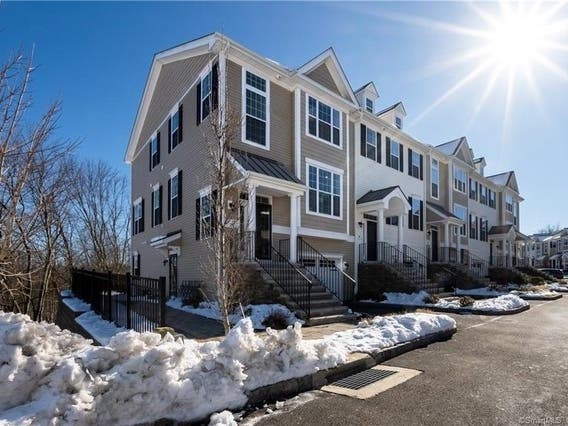 'Exceptional Natural Light & Wooded Views' At This Danbury End Unit