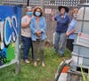 Bettylou explaining the composting and rain water harvesting systems to the SFF gardeners.