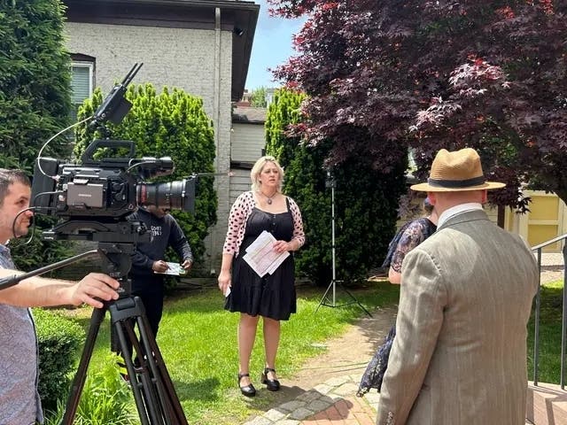 "She, Who Dared" Director Gabrielle Rosson gives Executive producer and actor Mark Meagher directions on set at the East Greenwich Town Hall.