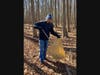 David Burk, Co-Chair of Temple Emanu-El’s Tikkun Olam Committee, demonstrates his “trash picking” technique at Nomahegan Park