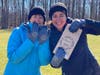 Kathi Wolder (Scotch Plains) and Daniela Shebitz (Cranford) show off the work gloves and “gift bags” which were provided by Madewell for all participants.