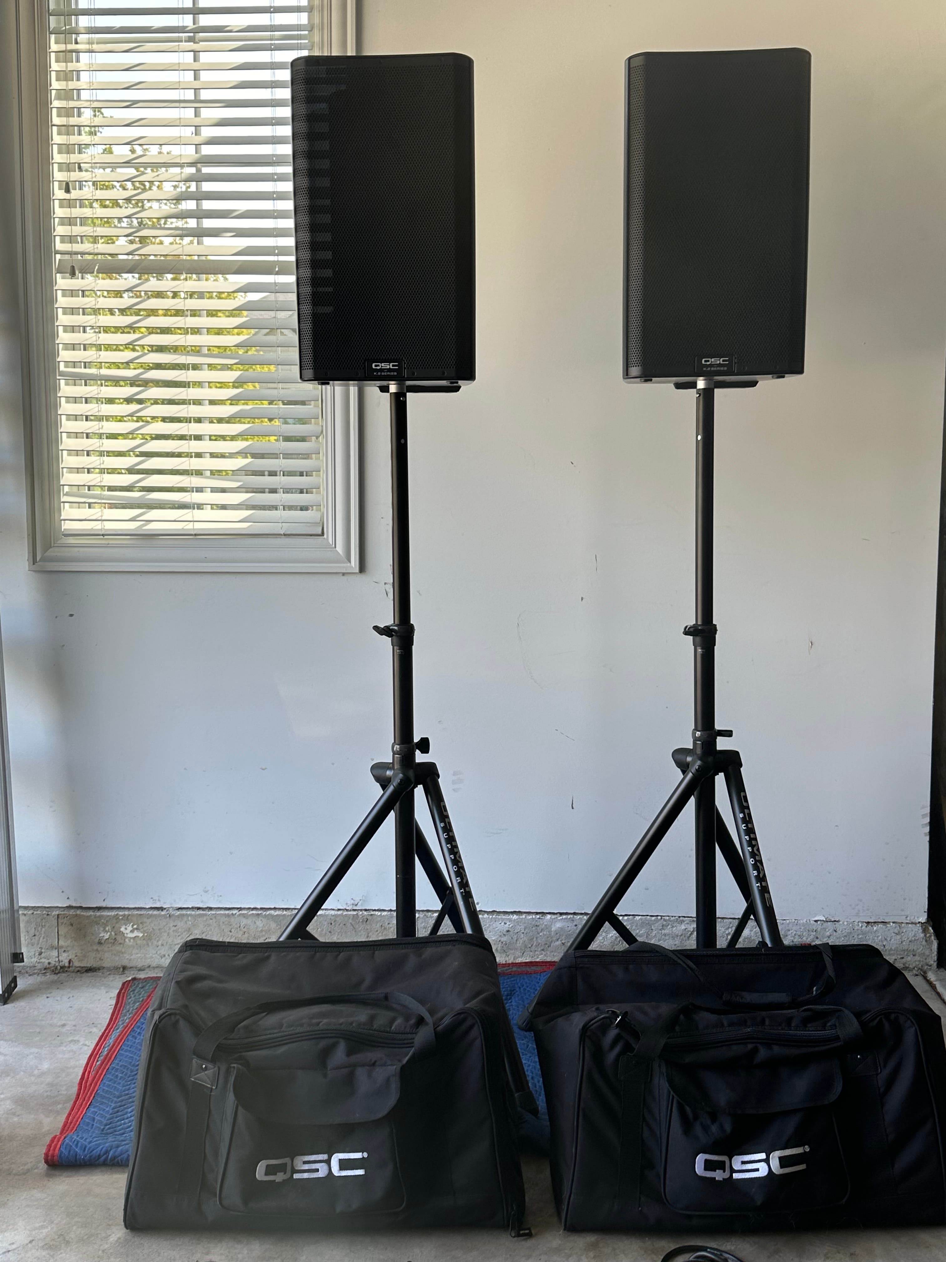 (2) QSC K12.2 Professional Speakers 2000w with carrying cases