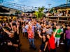 Patrons enjoy the summer vibe near the patio stage at 3D Sideouts Sports Tavern on Roberts Road in Island Lake, where the Freddy Jones Band performs Saturday, June 22.