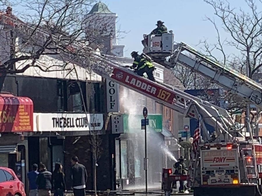 Two FDNY firefighters were hospitalized after responding to a fire in Bayside midday Tuesday.