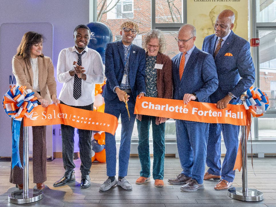 Trustee Samanda E. Morales, Terrence Jean Charles, Michael Corley, English Professor Lucinda Damon-Bach, Salem State President John D. Keenan and VP for Student Success Nate Bryant at Thursday's ceremony.