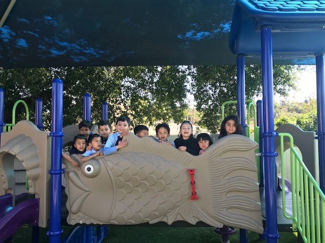 Brand-new play equipment!  Professionally shaded with padded grounds for safety.