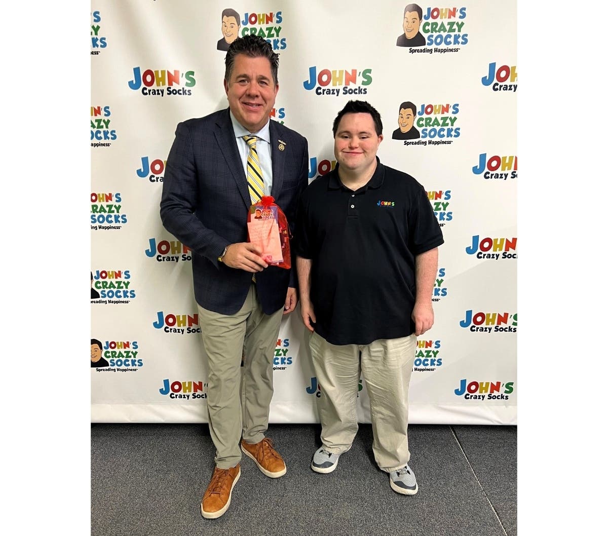 U.S. Congressman Nick LaLota (left) with John Cronin, co-founder of John's Crazy Socks in Farmingdale.