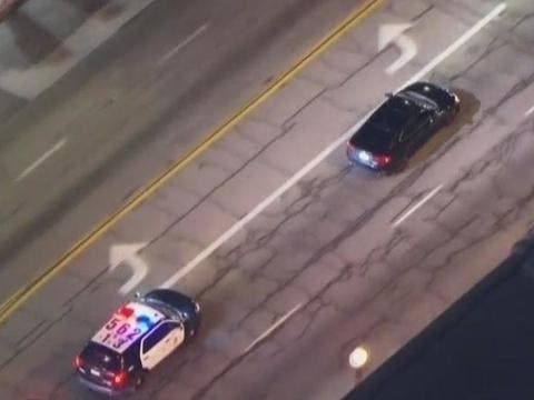 Armed Suspect Ditches Stolen Vehicle And Jumps Into Getaway Car During Pursuit