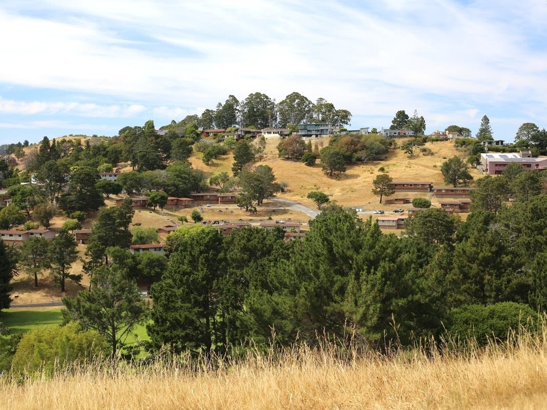 The property's owner plans to build a memory care facility, hundreds of multi-family housing units, a preschool, and a large fitness center on the Strawberry peninsula in southern Marin County.