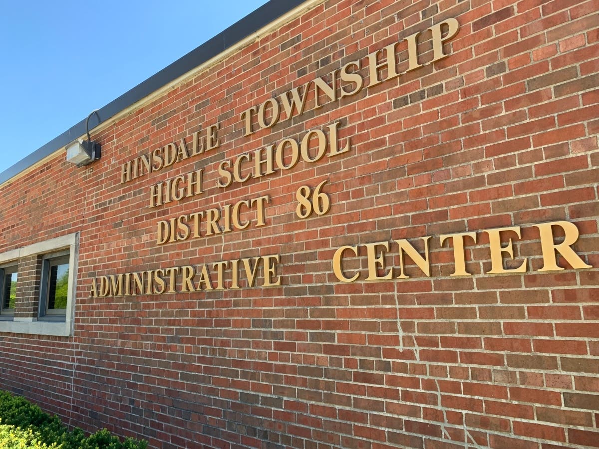 Hinsdale High School District 86 says it has not dropped its longtime motto, "A tradition of excellence."