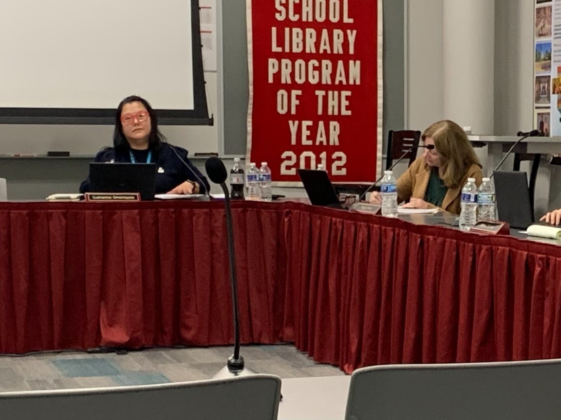 Catherine Greenspon (left), president of the Hinsdale High School District 86 board, shifted her position last week on offering an early bird PE course for underclassmen. Next to her is member Peggy James.