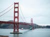 On the final leg of its trip from China to deliver a giant crane to the Port of Oakland, the Zhen Hua passes under the Golden Gate Bridge early Thursday with only a few feet of clearance.