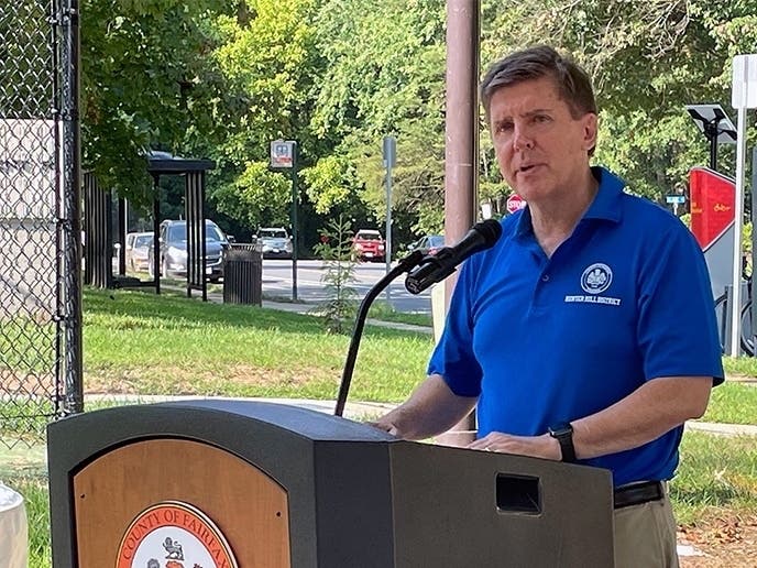 Hunter Mill District Supervisor Walter Alcorn is shown here in during the August 2021 dedication of a Capital Bikeshare facility outside the Southgate Community Center, which was renamed for Alcorn's predecessor Cathy Hudgins in October.