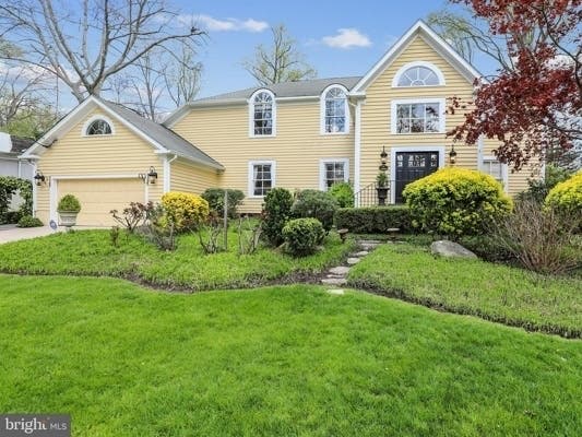 Built in 1989, this five-bedroom home located at 14635 Crossway Road boasts a private backyard with a heated mineral water pool with waterfalls, multiple tiered flagstone patio spaces, and professional landscaping.