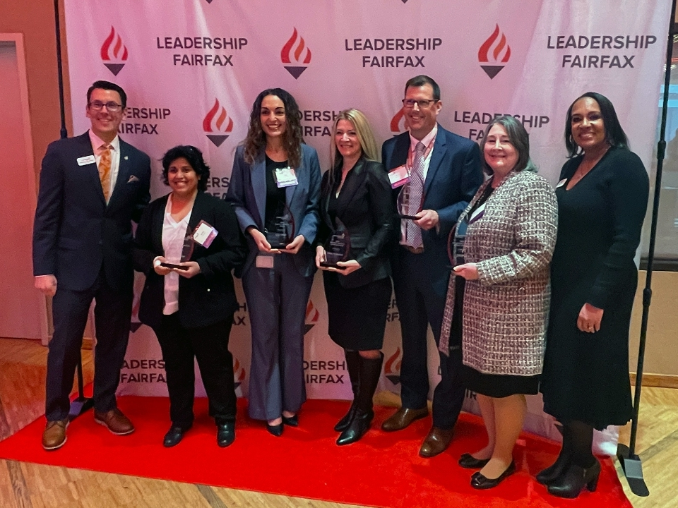 From left, Dominic Bonaiuto, Tarika Sethi, Saly Fayez, Taralyn Kohler, Shawn DeRose, Debi Alexander and Kia Cole-Hines pose for a photo following Thursday's Northern Virginia Leadership Awards Ceremony in Reston.