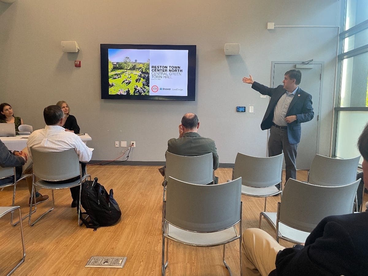 Hunter Mill Supervisor Walter Alcorn speaks to the audience at Monday night's meeting to discuss the latest version of the Reston Town Center North project plan.