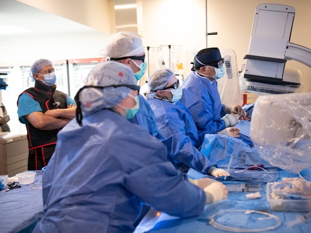 The TAVR team at Northwestern Medical McHenry Hospital recently completed its 100th aortic valve replacement procedure in which the valve is replaced with a catheter rather than having to opt for open heart surgery.