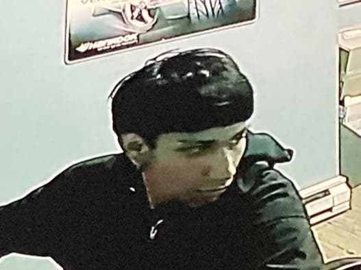 Frankfort Police released this photo of a man they are calling a person of interest in a burglary that took place at Malley's Discount Tire this week.