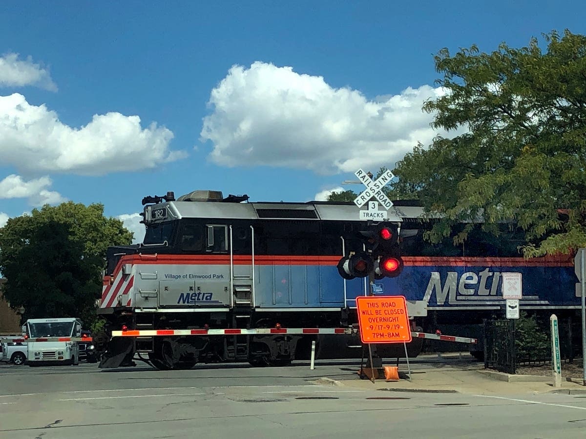 BNSF Trains are halted in both directions at Cicero on Tuesday because of a bridge strike that has caused delays in train service.