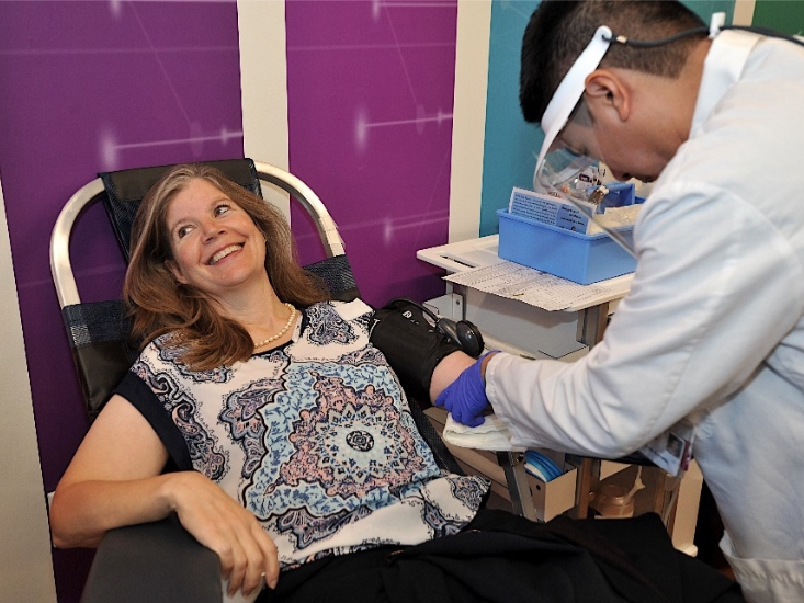 Dublin Councilmember Jean Josey donates blood on the new center's opening day. 